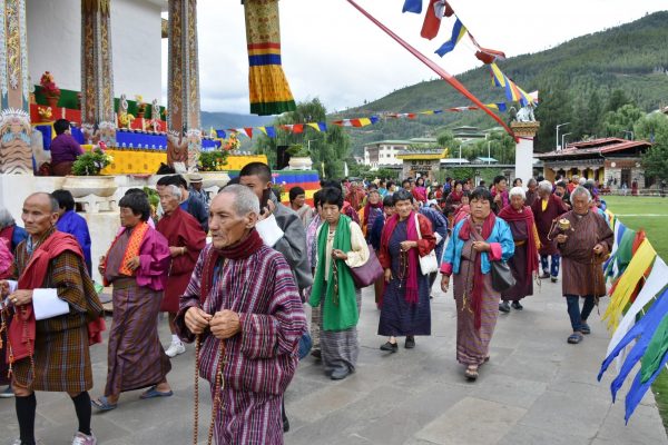 Bhutanese People In Traditional Garb Outside National Memorial Chorten